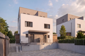 Moderne Doppelhaushälften mit kubischer Architektur, Flachdach und gepflasterter Hoffläche in Bad Nauheim.