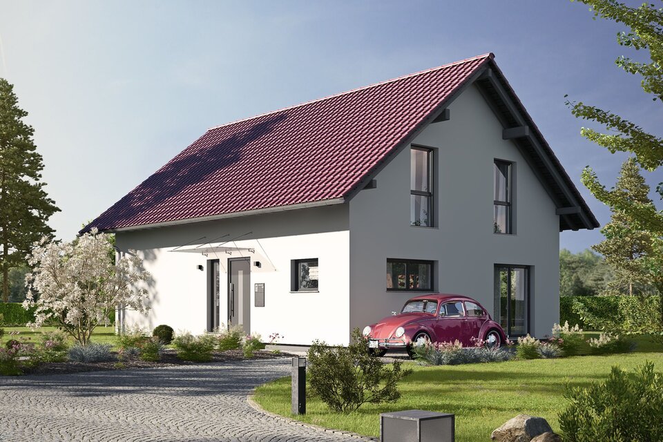 Fertighaus FingerHaus JUNO 402 mit heller Fassade, rotem Satteldach und gepflasterter Einfahrt mit Auto und Vorgarten bei Abendstimmung.