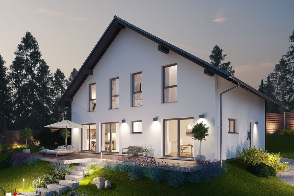 FingerHaus ALTERO 4 – modernes Einfamilienhaus mit Einliegerwohnung, Satteldach, heller Fassade und großen Fenstern in abendlicher Beleuchtung. Der Garten ist mit Rasen, Steinen und Lichtakzenten gestaltet.