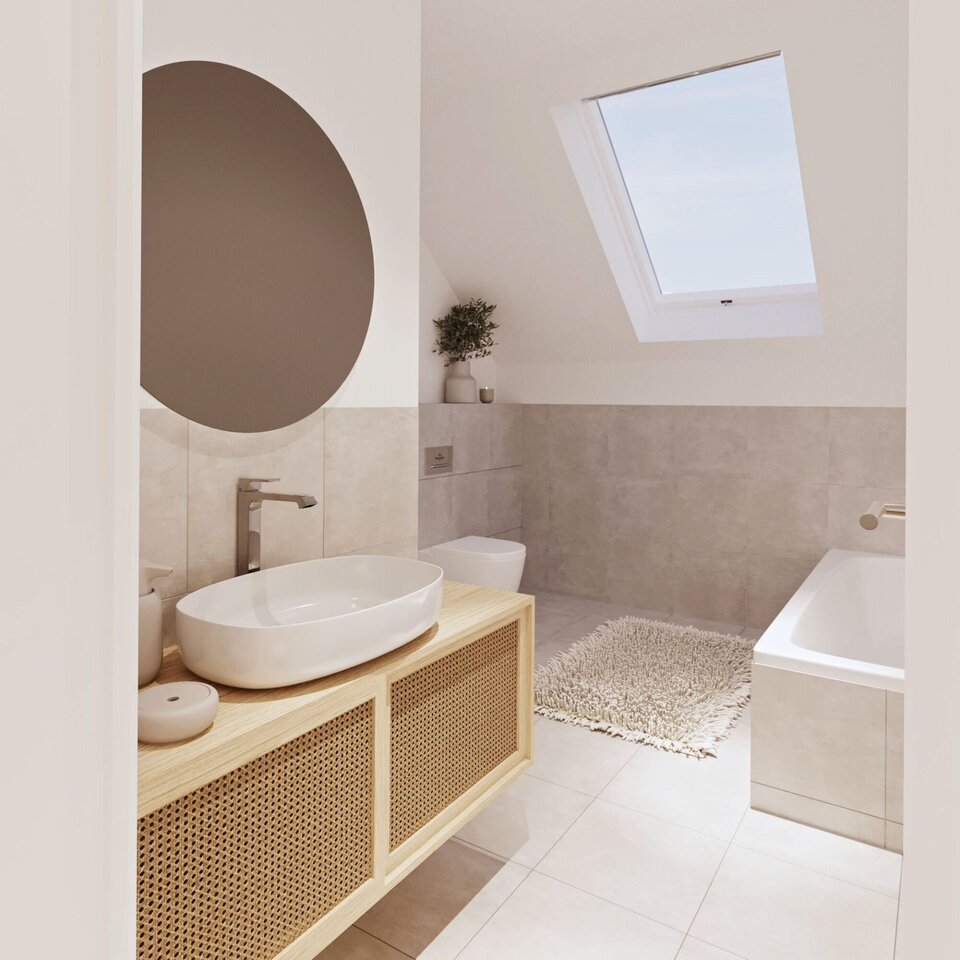 Modernes Badezimmer mit Dachfenster, runder Spiegel, heller Waschtisch und Badewanne.