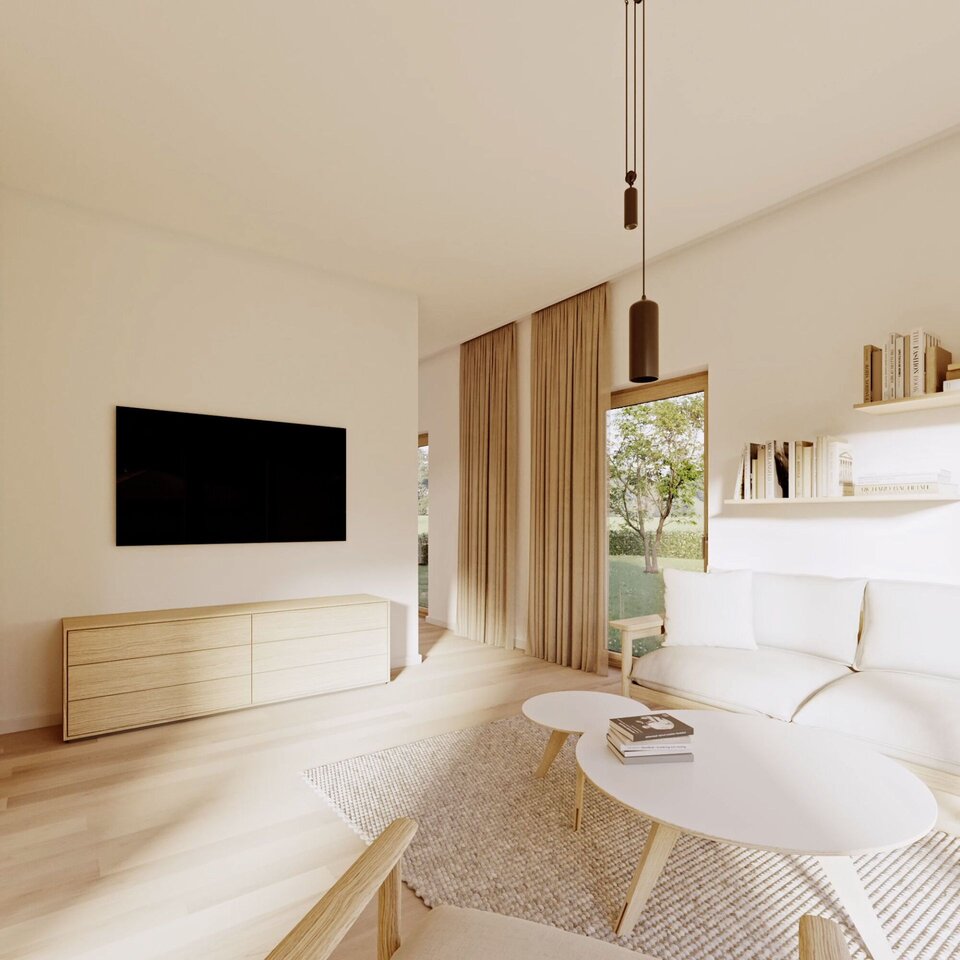 Helles Wohnzimmer mit großer Fensterfront, Sofa und modernem Lowboard.