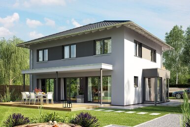 FingerHaus MEDLEY 410 – zweigeschossiges Einfamilienhaus mit Walmdach, hellgrauer Fassade und überdachter Terrasse. Im Garten befinden sich eine Rasenfläche, ein Sandspielplatz und Sitzmöbel.