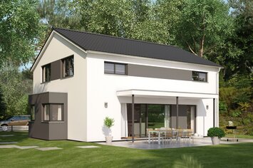 Hauskonzept MEDLEY 400 B S215 von FingerHaus mit klassischem Satteldach und gepflegtem Garten.