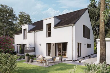 Modernes Haus FingerHaus DUO 230 mit heller Fassade, dunklem Satteldach und großer Terrasse im gepflegten Garten mit Rasen, Pflanzen und Sitzmöbeln.