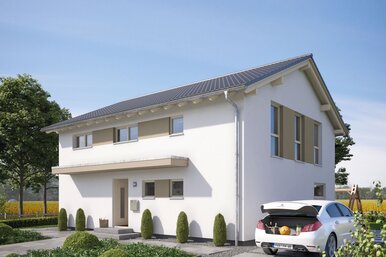 FingerHaus SENTO 500 – zweigeschossiges Einfamilienhaus mit Satteldach, heller Fassade und beige-braunen Fensterläden. Zu sehen sind überdachter Eingangsbereich, Garage und gepflasterte Einfahrt.