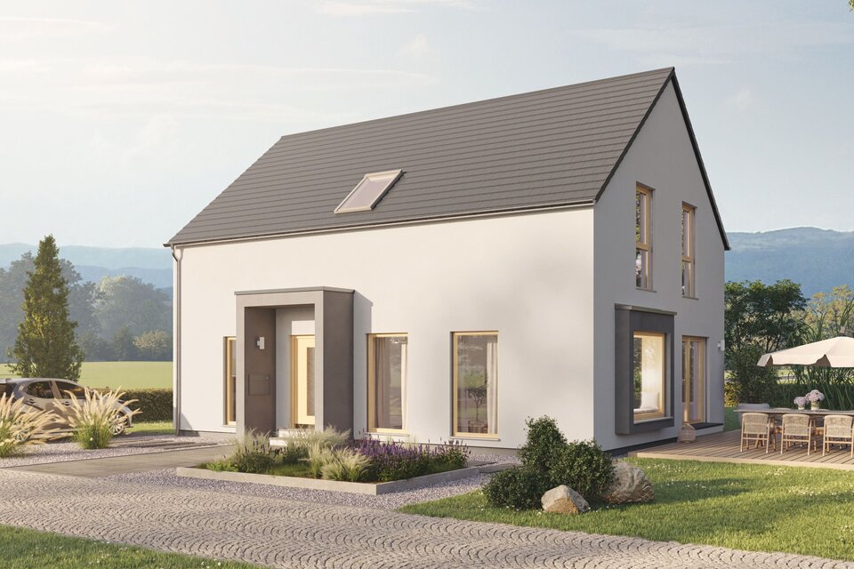 Modernes Einfamilienhaus LIV von FingerHaus mit Satteldach, heller Fassade und großzügigem Garten bei sonnigem Wetter.