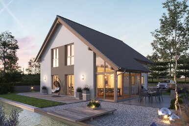 FingerHaus NEO 417 – modernes Einfamilienhaus mit Satteldach, weißer Fassade und großen Glasflächen in Abendstimmung. Im Vordergrund ein Garten mit Holzdeck, Sitzmöbeln, Kiesflächen und beleuchtetem Wasserbecken mit Seerosen.