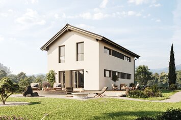 FingerHaus TALO 211 – zweigeschossiges Einfamilienhaus mit Satteldach, heller Fassade und bodentiefen Fenstern. Im Garten sind Rasenfläche, Terrasse und Pflanzbereiche mit Ziergräsern zu sehen.