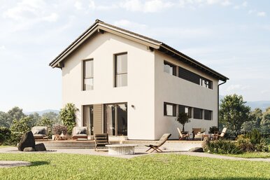 FingerHaus TALO 211 – zweigeschossiges Einfamilienhaus mit Satteldach, heller Fassade und bodentiefen Fenstern. Im Garten sind Rasenfläche, Terrasse und Pflanzbereiche mit Ziergräsern zu sehen.