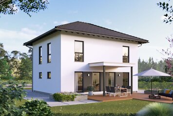 Modernes zweigeschossiges FingerHaus Fertighaus als Aktionshaus mit Flachdach und großer Terrasse in naturnaher Gartenlandschaft