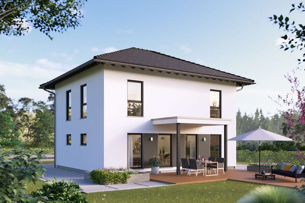 Modernes zweigeschossiges FingerHaus Fertighaus als Aktionshaus mit Flachdach und großer Terrasse in naturnaher Gartenlandschaft