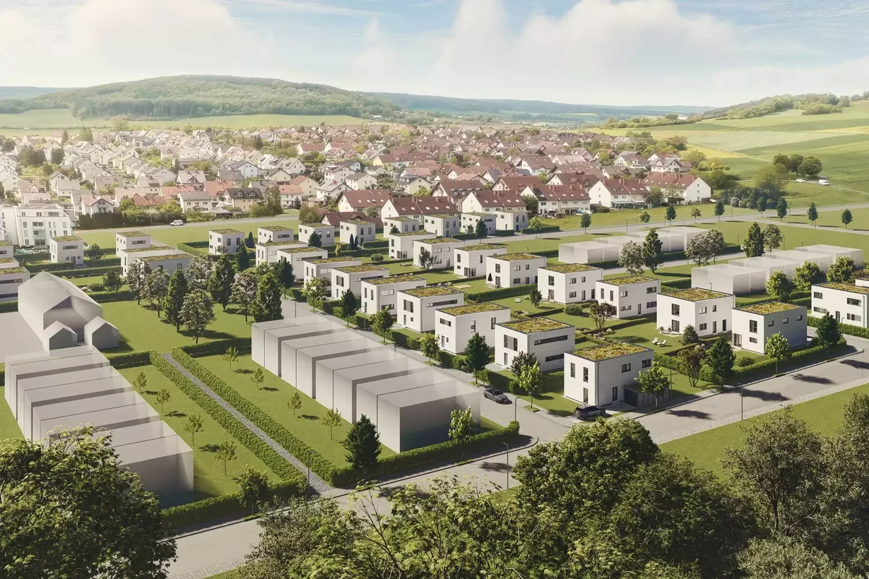 Luftaufnahme eines modernen FingerHaus Baugebiet "Leben in Fulda" mit Reihenhäusern und Einfamilienhäusern in einer grünen Landschaft mit Hügeln im Hintergrund