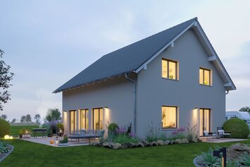 FingerHaus SENTO 400 – Einfamilienhaus mit Satteldach, heller Fassade, bodentiefen Fenstern und seitlichem Erkeranbau. Garten mit Rasen, Terrasse und Beeten in sanfter Abendstimmung.