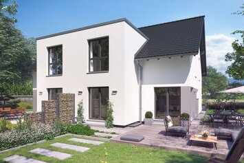 Zweigeschossiges Haus FingerHaus DUO 220 mit heller Fassade, dunklem Satteldach und moderner Terrasse im gepflegten Garten bei sonnigem Wetter.