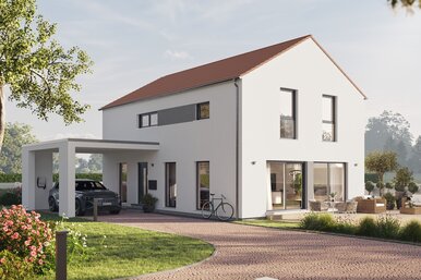 Fertighaus FingerHaus LIV 302 mit heller Fassade, Satteldach und gepflastertem Vorplatz mit Blumenbeeten und Bäumen.