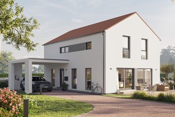 Fertighaus FingerHaus LIV 302 mit heller Fassade, Satteldach und gepflastertem Vorplatz mit Blumenbeeten und Bäumen.
