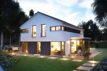 FingerHaus MEDLEY 410 – modernes zweigeschossiges Einfamilienhaus mit Satteldach, weiß-grauer Fassade und großen Fenstern in Abendstimmung. Innen- und Außenbeleuchtung schaffen eine warme Atmosphäre, im Garten sind Terrasse, Rasen und Steinweg sichtbar.