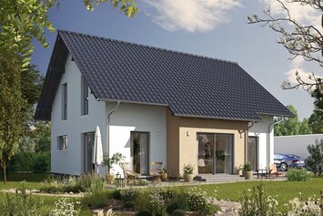 Fertighaus FingerHaus JUNO 200 mit heller Fassade, dunklem Satteldach und Gartenweg aus Kies, umgeben von blühenden Pflanzen und Rasen im Sonnenschein.