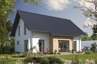 Fertighaus FingerHaus JUNO 200 mit heller Fassade, dunklem Satteldach und Gartenweg aus Kies, umgeben von blühenden Pflanzen und Rasen im Sonnenschein.